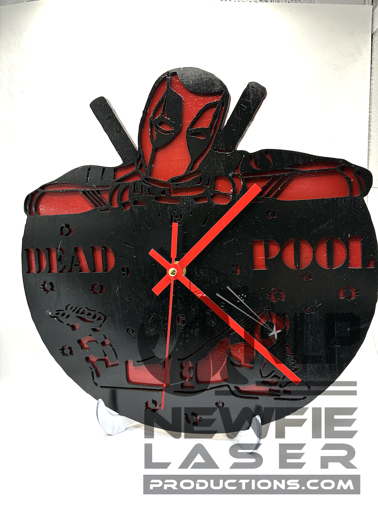 LASER CUTOUT DEADPOOL CLOCK PROCESSED ON LAYERS OF PINE WOOD