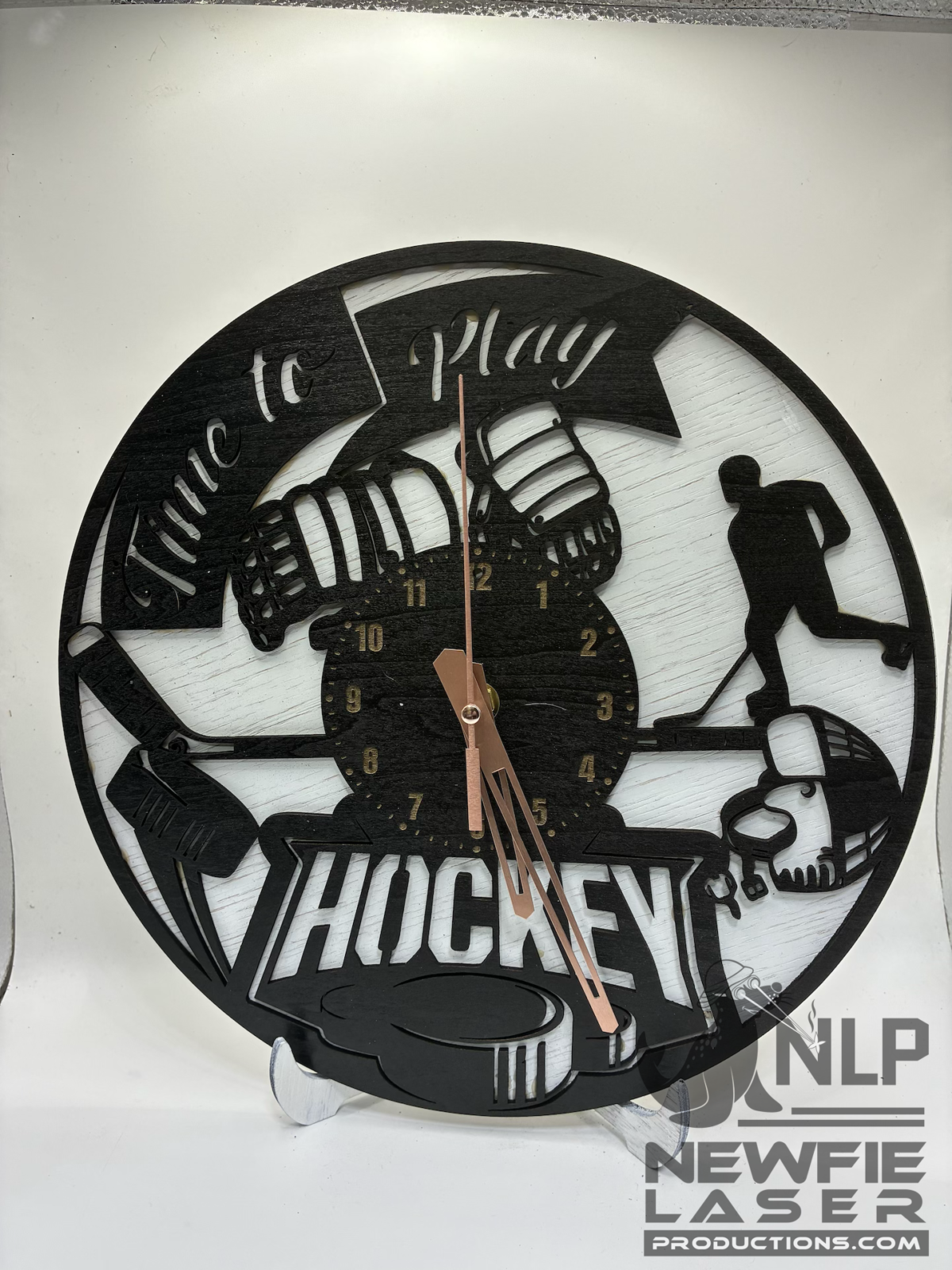 LASER CUTOUT HOCKEY CLOCK PROCESSED ON LAYERS OF PINE WOOD