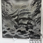 DEEP LASER ENGRAVED ON CERAMIC TILE PIRATE SHIP IN STORM ENGRAVED.ON CERAMIC TILE CLEAR COAT ADDED & INCLUDES STAND 12X12