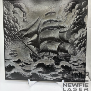 DEEP LASER ENGRAVED ON CERAMIC TILE PIRATE SHIP IN STORM ENGRAVED.ON CERAMIC TILE CLEAR COAT ADDED & INCLUDES STAND 12X12